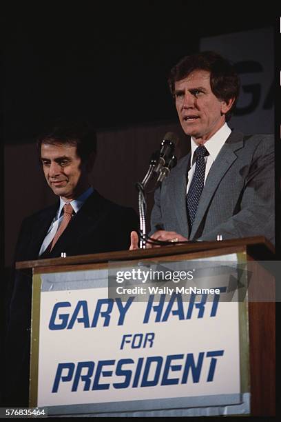 Democratic presidential candidate Gary Hart speaks during a rally. Standing with him is astronomer Carl Sagan.