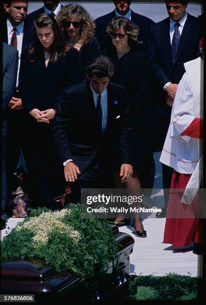 John F. Kennedy Jr. During the funeral for their mother, Jacqueline Bouvier Kennedy Onassis, at Arlington Cemetery.