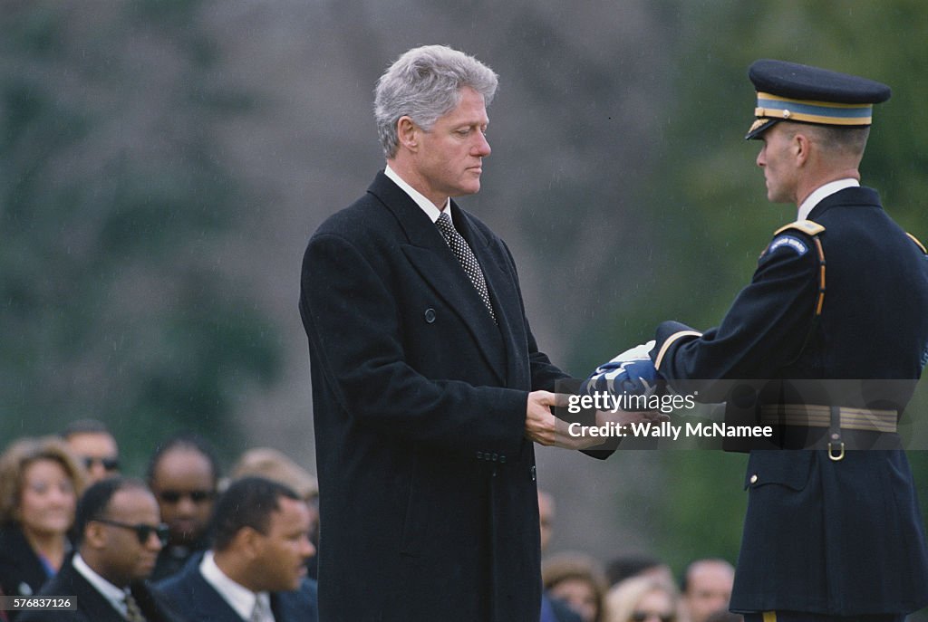 President Clinton Receiving American Flag