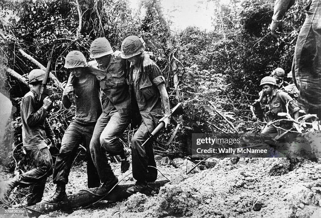 Soldiers Transporting Wounded to Medevac