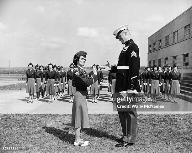 Sergeant Standing with Female Marine