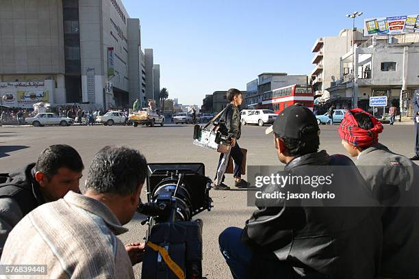 Director Oday Rasheed and crew shooting a scene from his film "Underexposed." The boy in the scene, thirteen-year-old Marwan Waleed, was cast on the...
