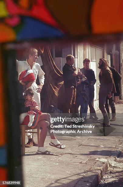 Group of Merry Pranksters, including their leader Ken Kesey, outside The Warehouse on Harriet Street. Kesey and the other Pranksters were proponents...