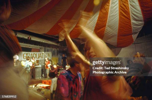 People dance at the Acid Test Graduation, a celebration organized by Ken Kesey and his Merry Pranksters, in which participants graduated "beyond...