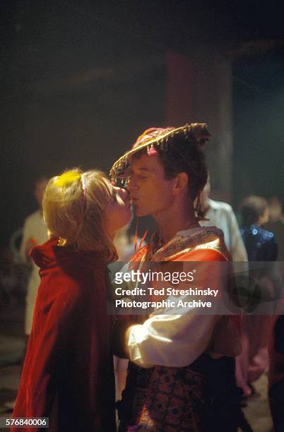 Couple kisses at the Acid Test Graduation, a celebration organized by Ken Kesey and his Merry Pranksters, in which participants graduated "beyond...