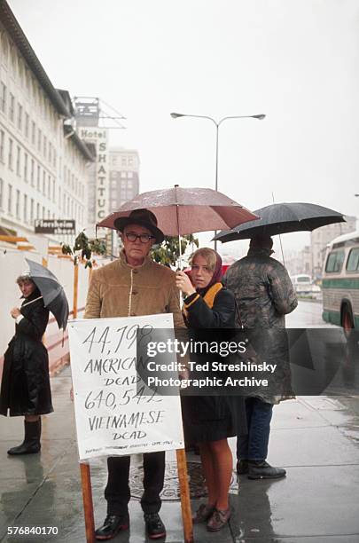 Demonstrators hold signs in Berkeley, California to demand a moratorium on the war in Vietnam, 1969.