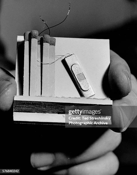 Matchbook holds a microphone device for private detectives.