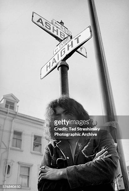 Jerry Garcia, founder of the rock band the Grateful Dead, stands at the corner of Haight and Ashbury in San Francisco, 1966.