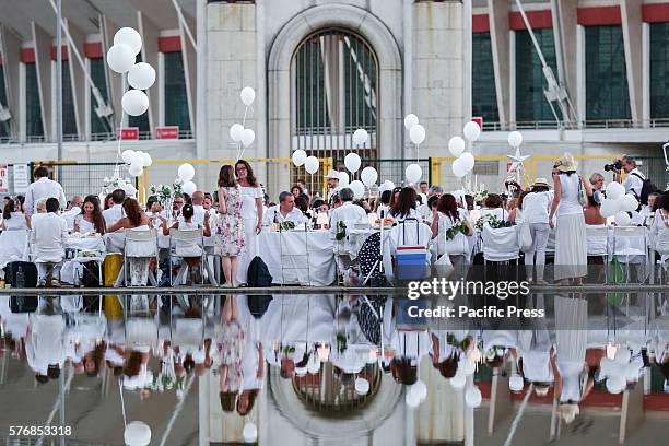 Thirteen thousand persons at the 5th edition of "Dinner in White", which this year saw as location Piazza D'Armi, in front of the Olympic Stadium, in...