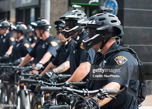 Cleveland police officers block an intersection during a demonstration near the site of the Republican National Convention on July 17, 2016 in...