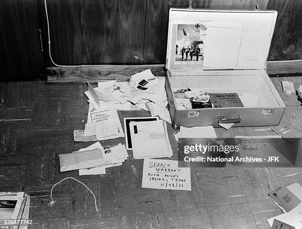 Suitcase, photographs and documents, confiscated by the FBI as evidence, from houses where Lee Harvey Oswald was living at the time of the...