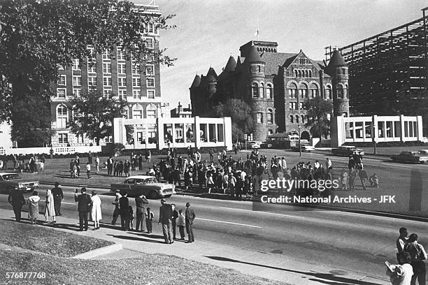 Mourners gathered in Dealey Plaza at the site of the assassination of President John F. Kennedy.