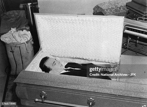 The body of Lee Harvey Oswald lies in a casket at Parkland Morgue in Dallas, Texas.