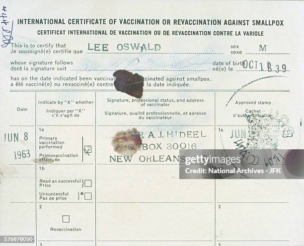 Smallpox vaccination card, dated June 8, 1963. Lee Oswald and A.J. Hidell, Lee Harvey Oswald's pseudonym, are both listed on the form.