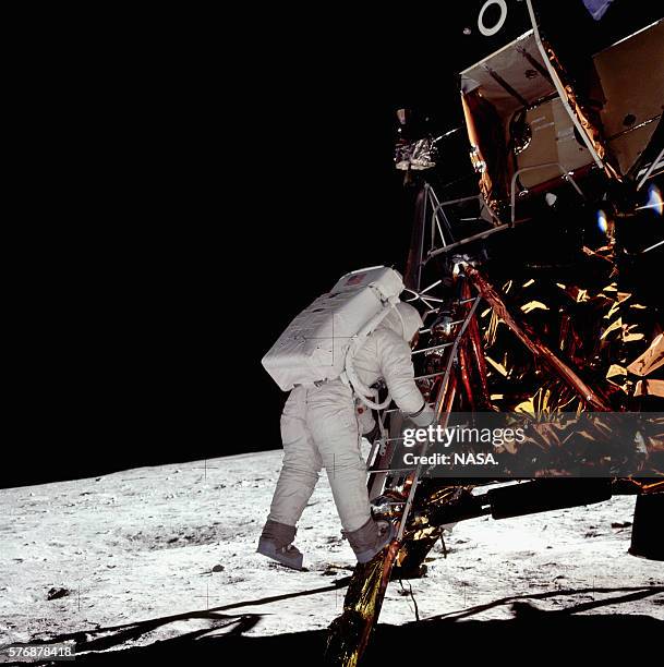 Apollo 11 astronaut Buzz Aldrin takes his last step off the Eagle lunar module onto the surface of the Moon.