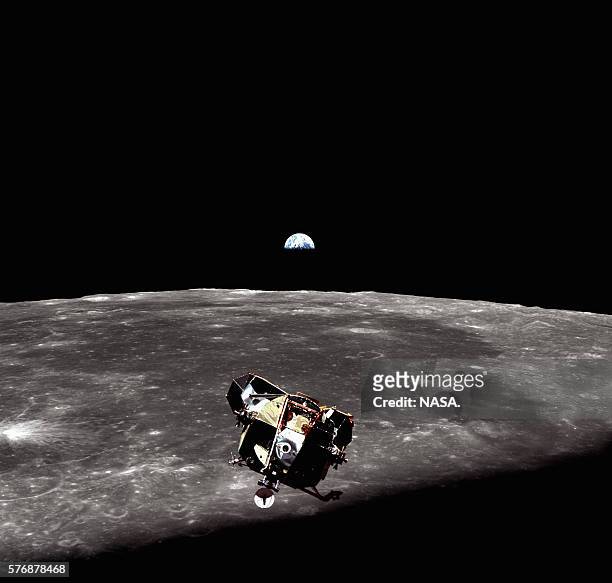 The Eagle, the lunar module of Apollo 11, prepares to dock with the command module after ascending from the Moon's surface. | View from: 'Columbia'...