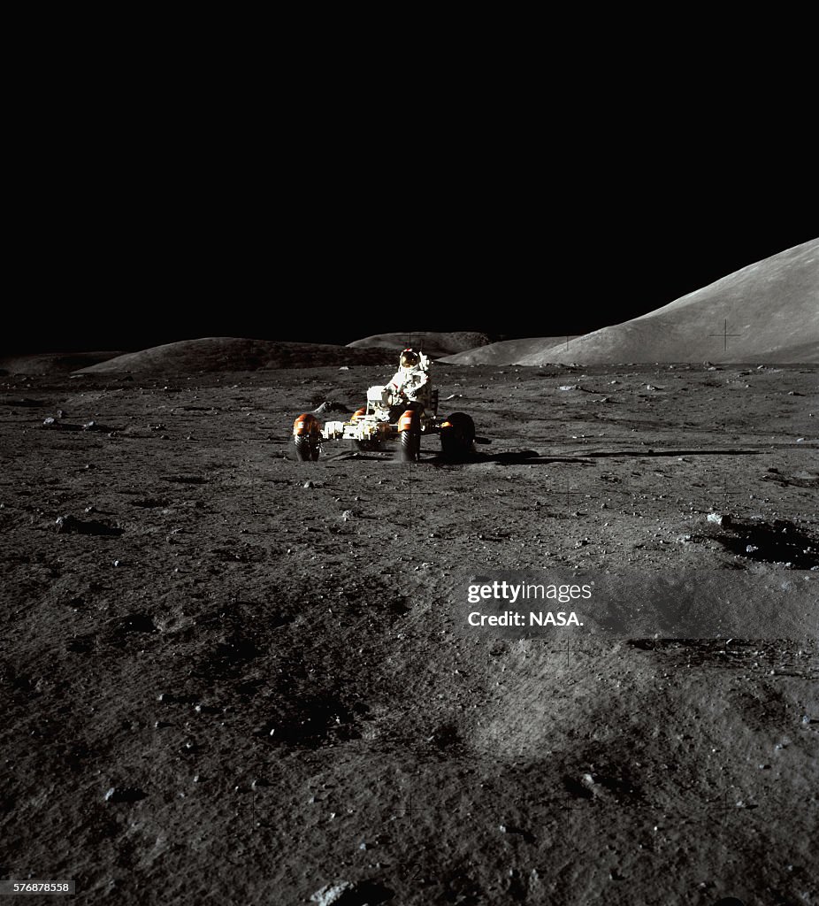The Lunar Rover One of the Apollo 17 astronauts drives the four-wheeled lunar rover ...