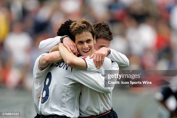 England's Joe Cole, facing, hugs teammate Kieran Richardson after his second goal. The English Men's National team defeated the US National Men's...