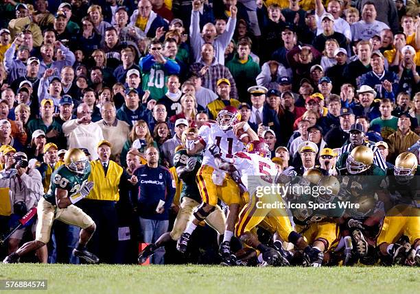 Quarterback Matt Leinart is pushed in to the endzone by teammate Reggie Bush for a touchdown in the closing moments of the USC Trojans 34-31 victory...