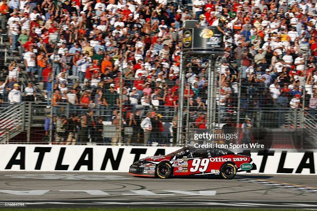 Mbna Racing Carl Edwards takes the checkers to win the Bass Pro Shops MBNA 500 ...