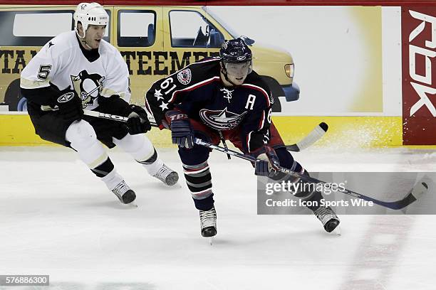 Columbus Blue Jackets' Rick Nash plays against Pittsburgh Penguins' Rob Scuderi at Nationwide Arena in Columbus, Ohio.