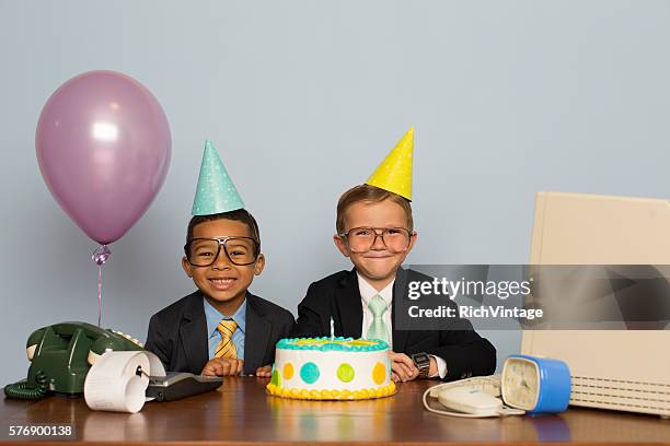 young boy businessmen celebrate with business birthday cake - happy birthday nerd stock pictures, royalty-free photos & images