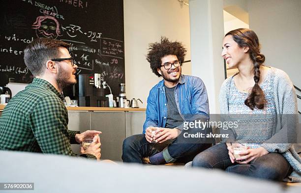 creative group of people having a coffee break - coffee meeting with friends stockfoto's en -beelden