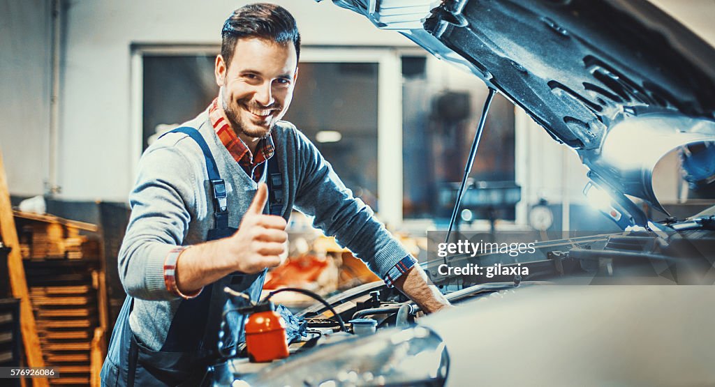 Car mechanic at work.