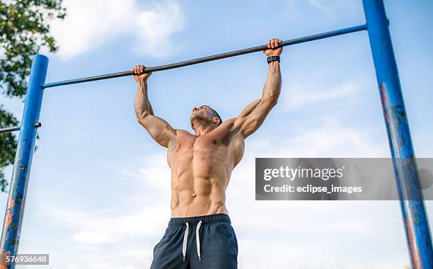 outdoor pull ups - chin ups stock pictures, royalty-free photos & images