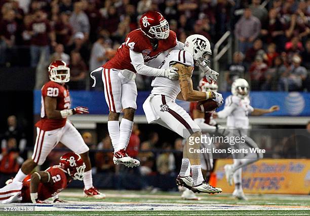 Texas A&M Aggies wide receiver Mike Evans makes the catch in front of Oklahoma Sooners defensive back Aaron Colvin during the 2013 AT&T Cotton Bowl...