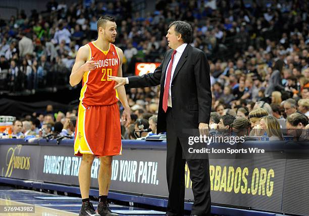 Houston Rockets power forward Donatas Motiejunas chats with Houston Rockets head coach Kevin McHale during an NBA game between the Houston Rockets...