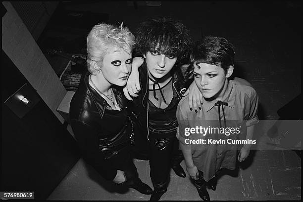 Three teenage girls in punk fashions, at Middleton Civic Hall in Manchester for performances by British punk groups Slaughter and the Dogs and The...