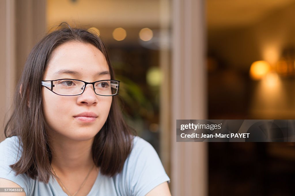 Young asian girl in a restaurant