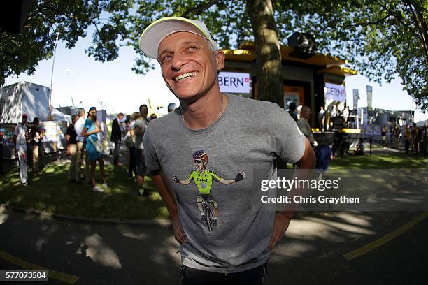 Team owner Oleg Tinkov points to his shirt with Peter Sagan of Slovakia riding for Tinkoff after stage 16 of the 2016 Le Tour de France, a 209km...