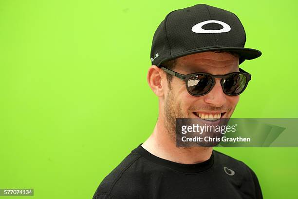 Mark Cavendish of Great Britain riding for Team Dimension Data stands outside of his team bus prior to stage 16 of the 2016 Le Tour de France, a...