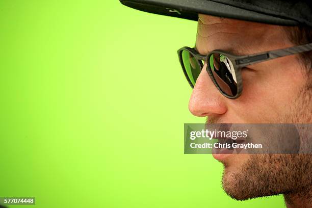 Mark Cavendish of Great Britain riding for Team Dimension Data stands outside of his team bus prior to stage 16 of the 2016 Le Tour de France, a...