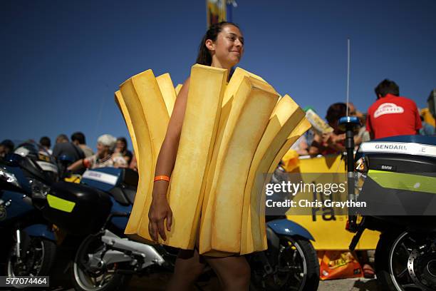 Member of the publicity caravan is seen prior to stage 16 of the 2016 Le Tour de France, a 209km stage from Moirans-En-Montagne to Berne at on July...