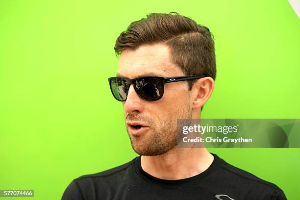 Bernhard Eisel of Austria riding for Team Dimension Data stands outside of his team bus prior to stage 16 of the 2016 Le Tour de France, a 209km...