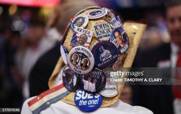 Delegate wears a hat on the first day of the Republican National Convention on July 18, 2016 at the Quicken Loans Arena in Cleveland, Ohio. The...