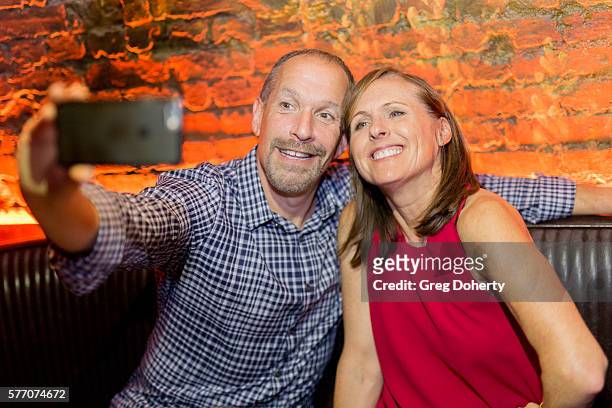 Manager Steven Levy and Actress Molly Shannon take a selfie at the 2016 Outfest Los Angeles Closing Night Gala Of "Other People" After Party at The...