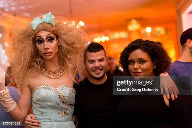 Trash and guests pose for a picture at the 2016 Outfest Los Angeles Closing Night Gala Of "Other People" After Party at The Theatre at Ace Hotel on...