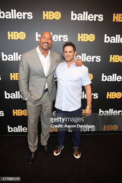 Dwayne Johnson and series creator Stephen Levinson attend the HBO Ballers Season 2 Red Carpet Premiere and Reception on July 14, 2016 at New World...
