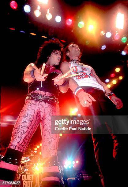 American Rock musicians Frankie Banali and Kevin DuBrow , both of the band Quiet Riot, perform onstage, Des Moines, Iowa, August 20, 1984.