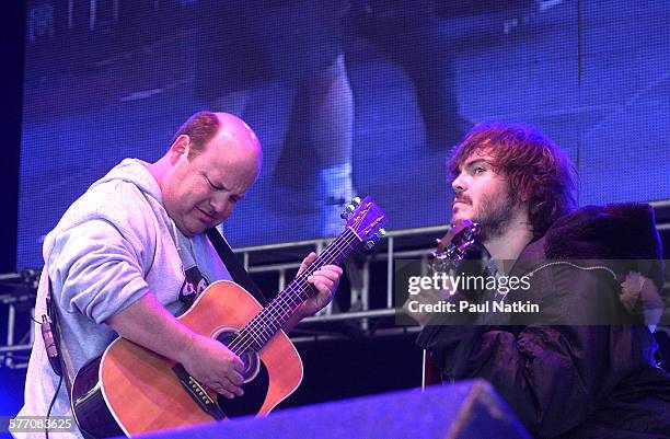 American comedians, actors, and musicians Kyle Gass and Jack Black, both of the band Tenacious D, perform onstage, Chicago, Illinois, May 18, 2002.