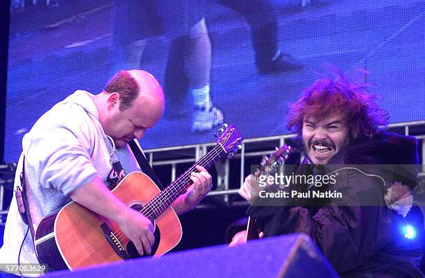 American comedians, actors, and musicians Kyle Gass and Jack Black, both of the band Tenacious D, perform onstage, Chicago, Illinois, May 18, 2002.