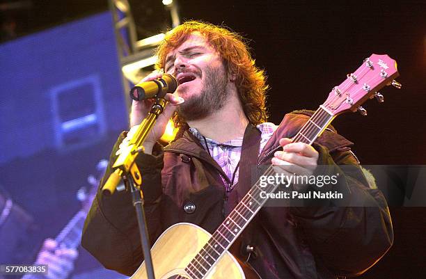 American comedian, actor, and musician Jack Black, of the band Tenacious D, performs onstage, Chicago, Illinois, May 18, 2002.