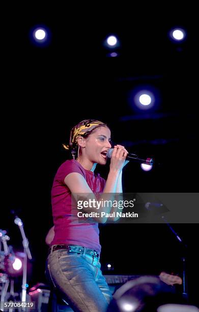 Canadian Pop musician Nelly Furtado performs onstage at the World Music Theater, Tinley Park, Illinois, August 2, 2001.