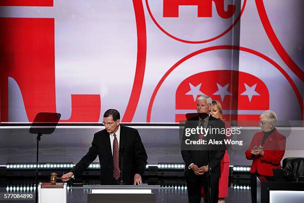 Sen. John Barrasso bangs the gavel while U.S. Rep. Steve Womack , Co-Chair, Platform Committee, Oklahoma Gov. Mary Fallin and Rep. Virginia Foxx look...