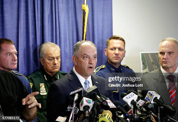 Louisiana Governor John Bel Edwards speaks about three local police officers who were killed by gunman Gavin Long Sunday morning during a news...