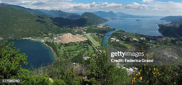 panorama view of lake mergozzo and lake maggiore with the borromean gulf in northern italy - baveno foto e immagini stock